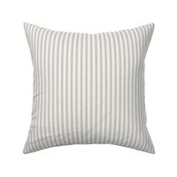 Classic mattress ticking stripe fabric shown on a square pillow. The color of the stripe is stormy gray on off white.