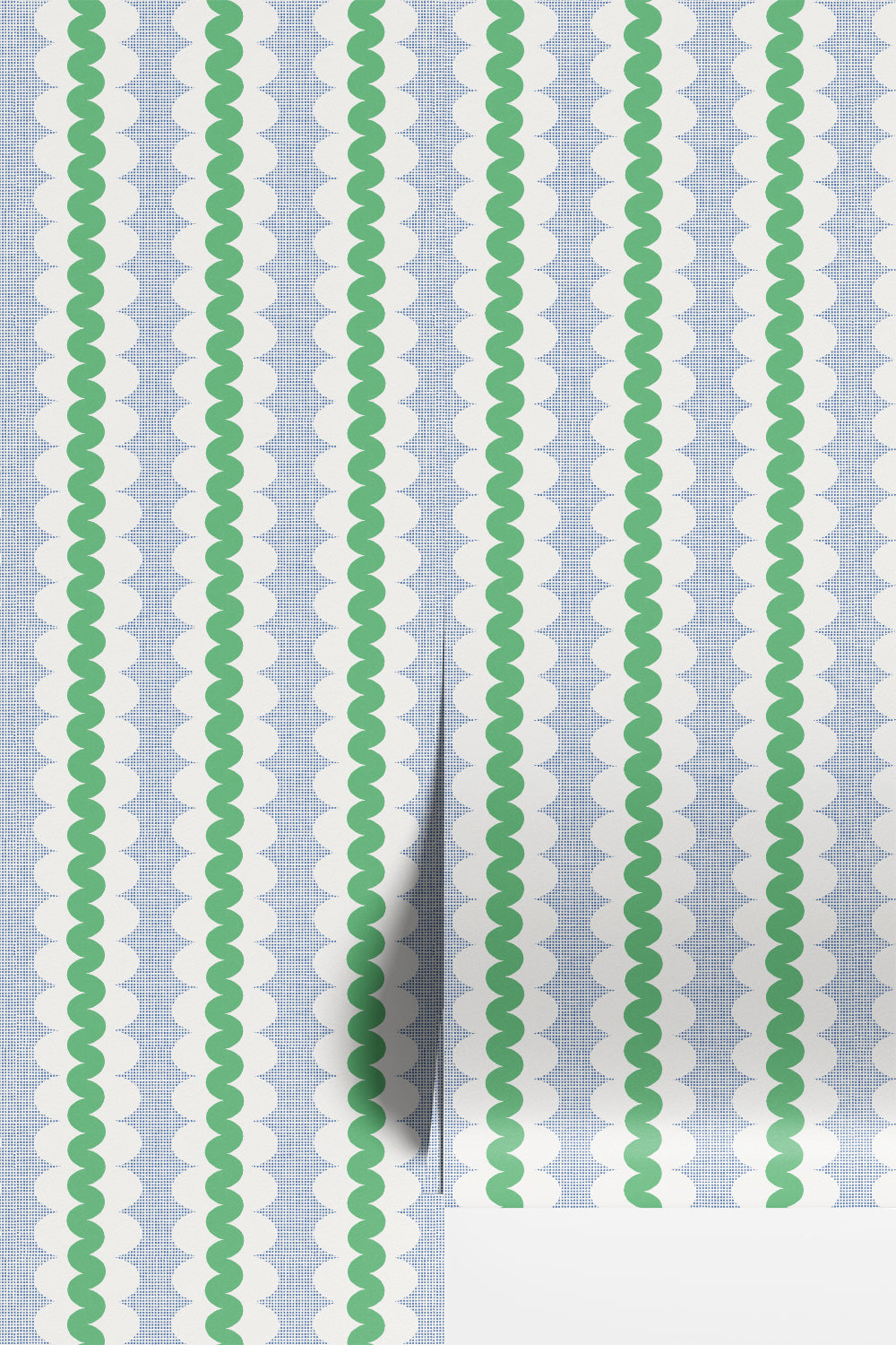 Light blue and white patterned wallpaper with vertical green wavy stripes, shown partially unrolled with a fold revealing a white surface underneath.