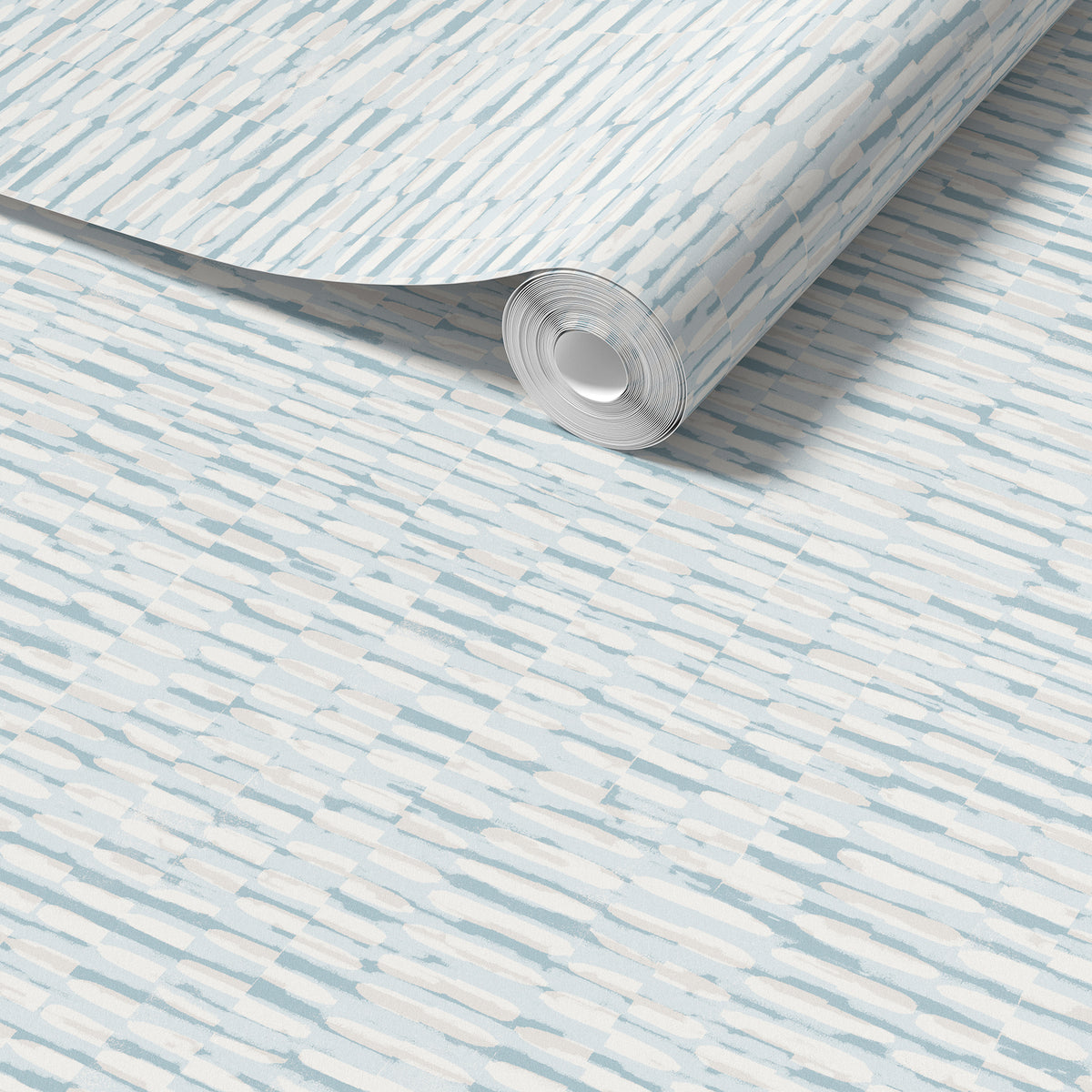 A roll of light beige wallpaper with a subtle horizontal woodgrain pattern, shown partially unrolled over a matching flat surface.
