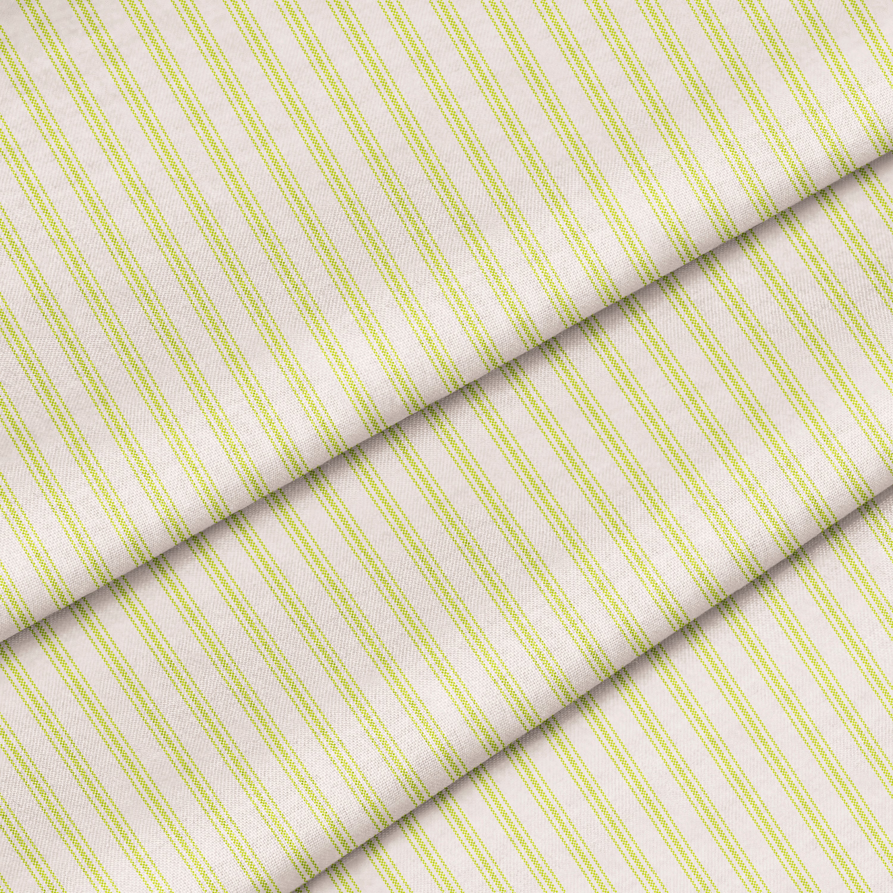 A close-up of a lime green fabric with a classic ticking stripe pattern. The fabric is folded onto itself.