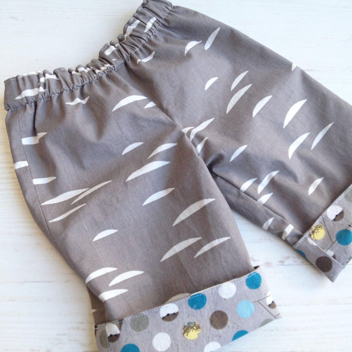 organic cotton reversible pants in barn swallow and shroom, charley harper - little girl Pearl