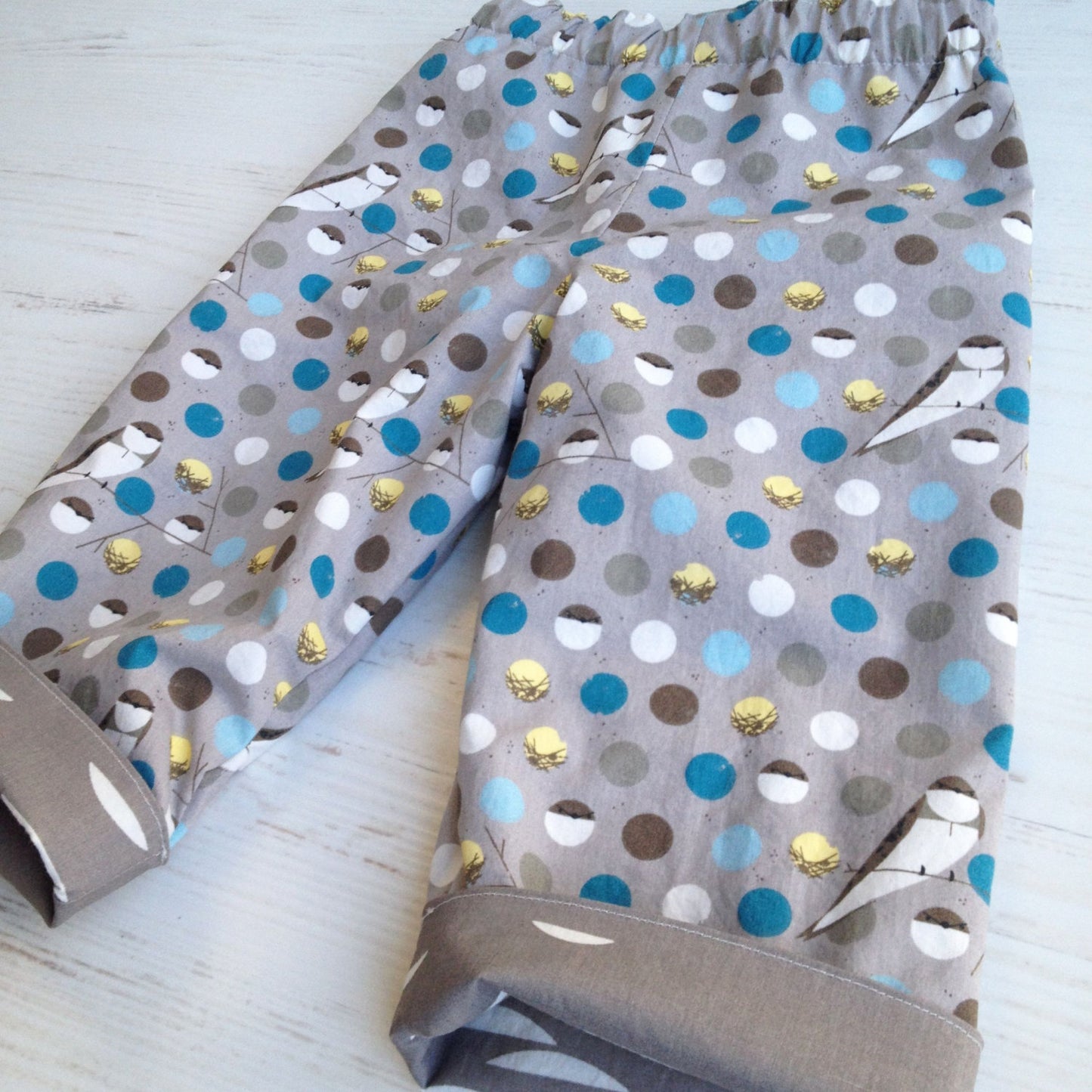 organic cotton reversible pants in barn swallow and shroom, charley harper - little girl Pearl