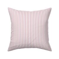 Classic mattress ticking stripe fabric shown on a square pillow. The color of the stripe is magenta on off white.