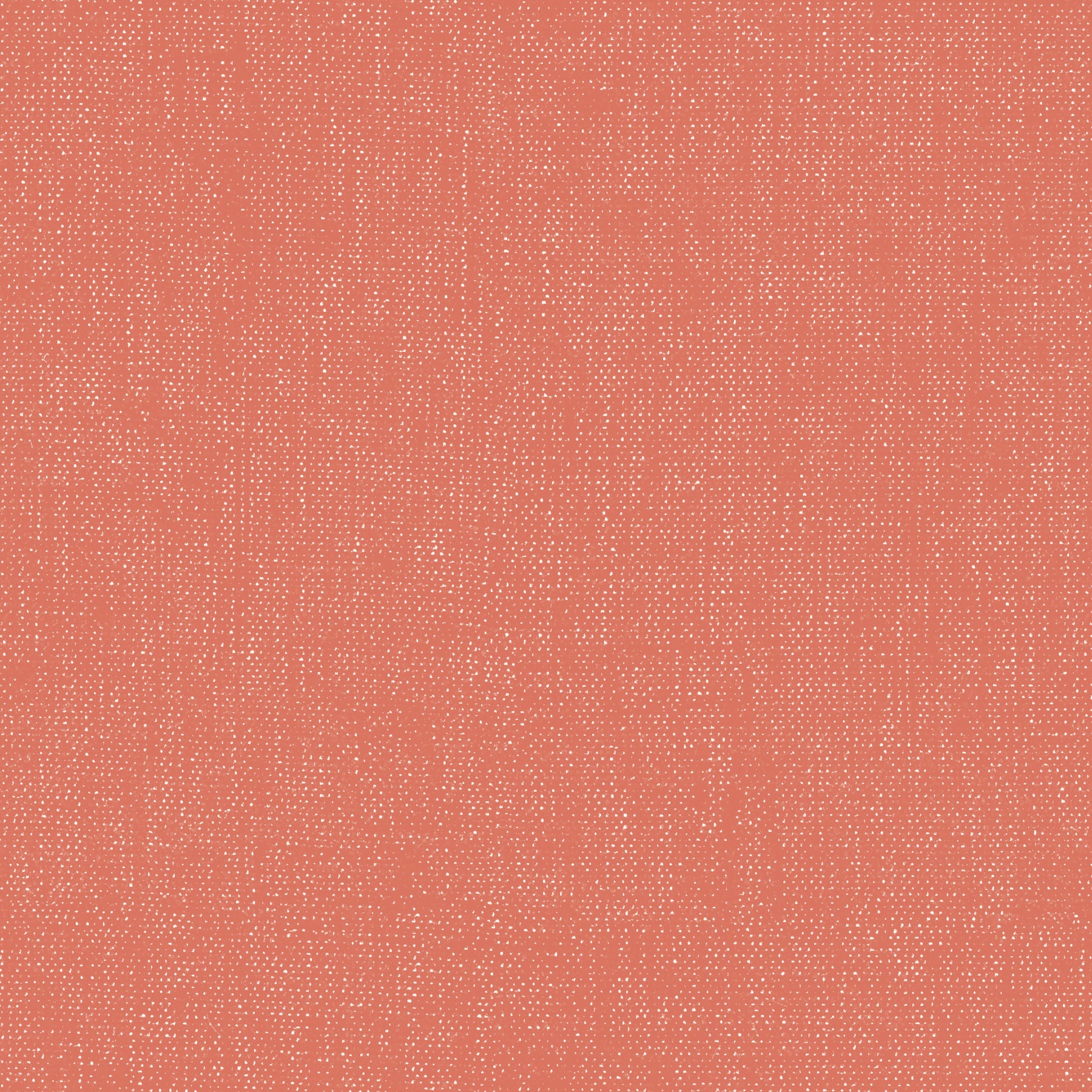 A close-up of a textured fabric or wallpaper swatch in a warm coral pink color with a fine woven pattern.