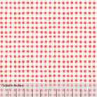 Gingham plaid patterned fabric in red pink, and off white. There is an inch scale overlaid at the bottom for visual reference.