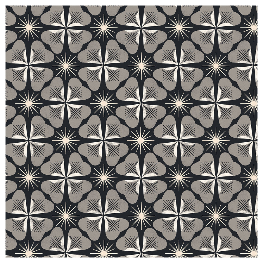 Patterned fabric with an organic abstract clover leaf geometric design on a black background