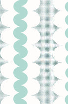 A repeating geometric pattern featuring mint green wavy vertical stripes, dotted square grid, and white oval forms on a white background.
