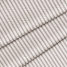 Close-up of a charcoal black and white ticking stripe fabric. The fabric is folded onto itself.