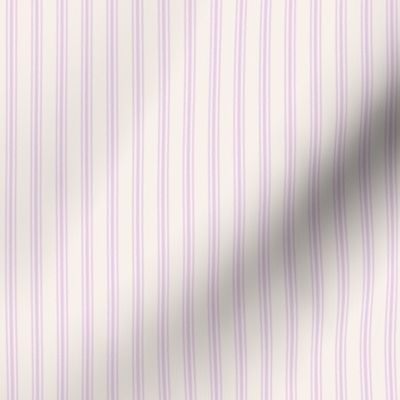 classic mattress ticking stripe fabric in lilac pastel on creamy white