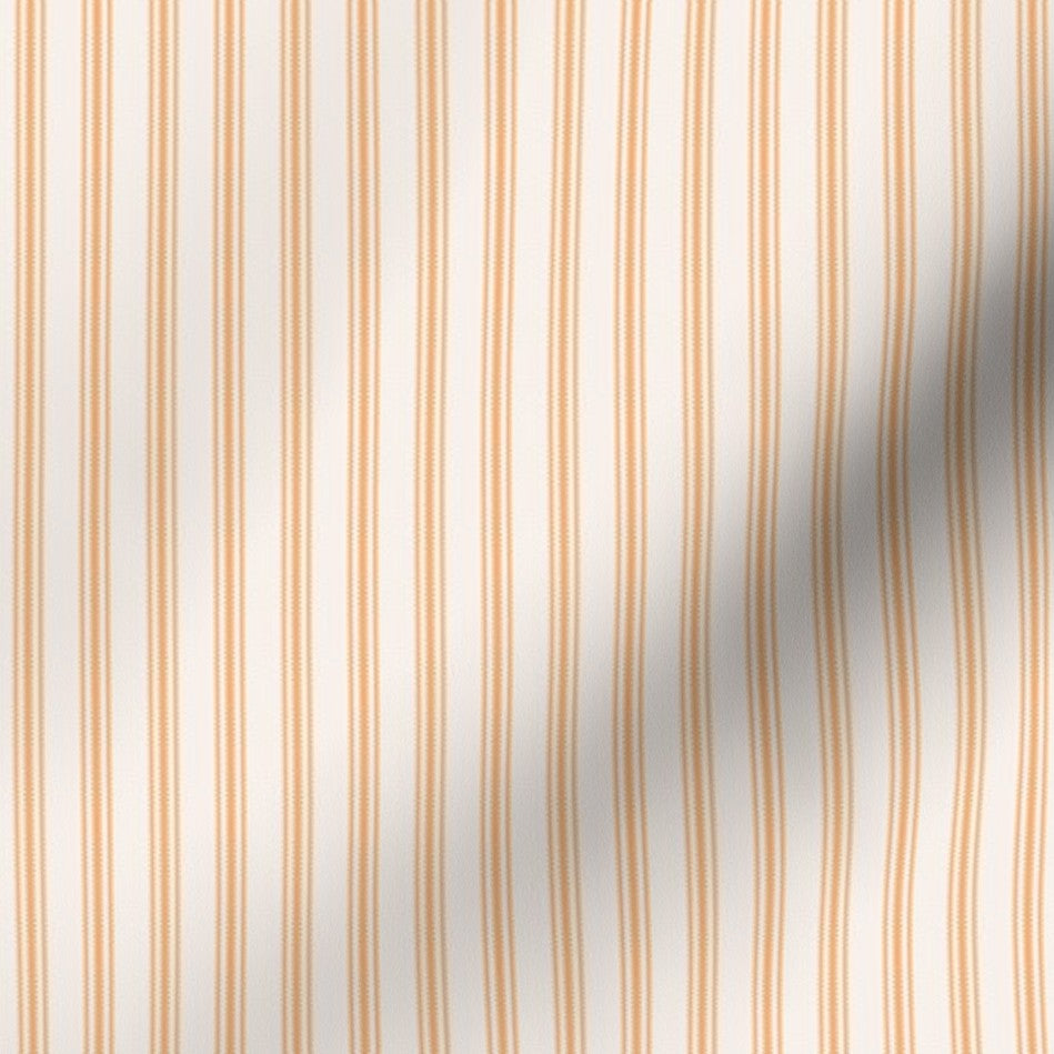 classic mattress ticking stripe fabric in tangerine orange on creamy white