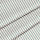 A close-up of a striped fabric featuring alternating green and white stripes. The fabric is folded onto itself.