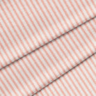 A close-up image of a classic red ticking stripe. The fabric is folded onto itself.