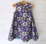 Load image into Gallery viewer, reversible jumper dress in lilac millefiori and lavender morning glory - little girl Pearl
