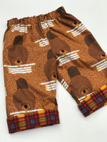 Load image into Gallery viewer, reversible pants in Charley Harper beaver chew - little girl Pearl
